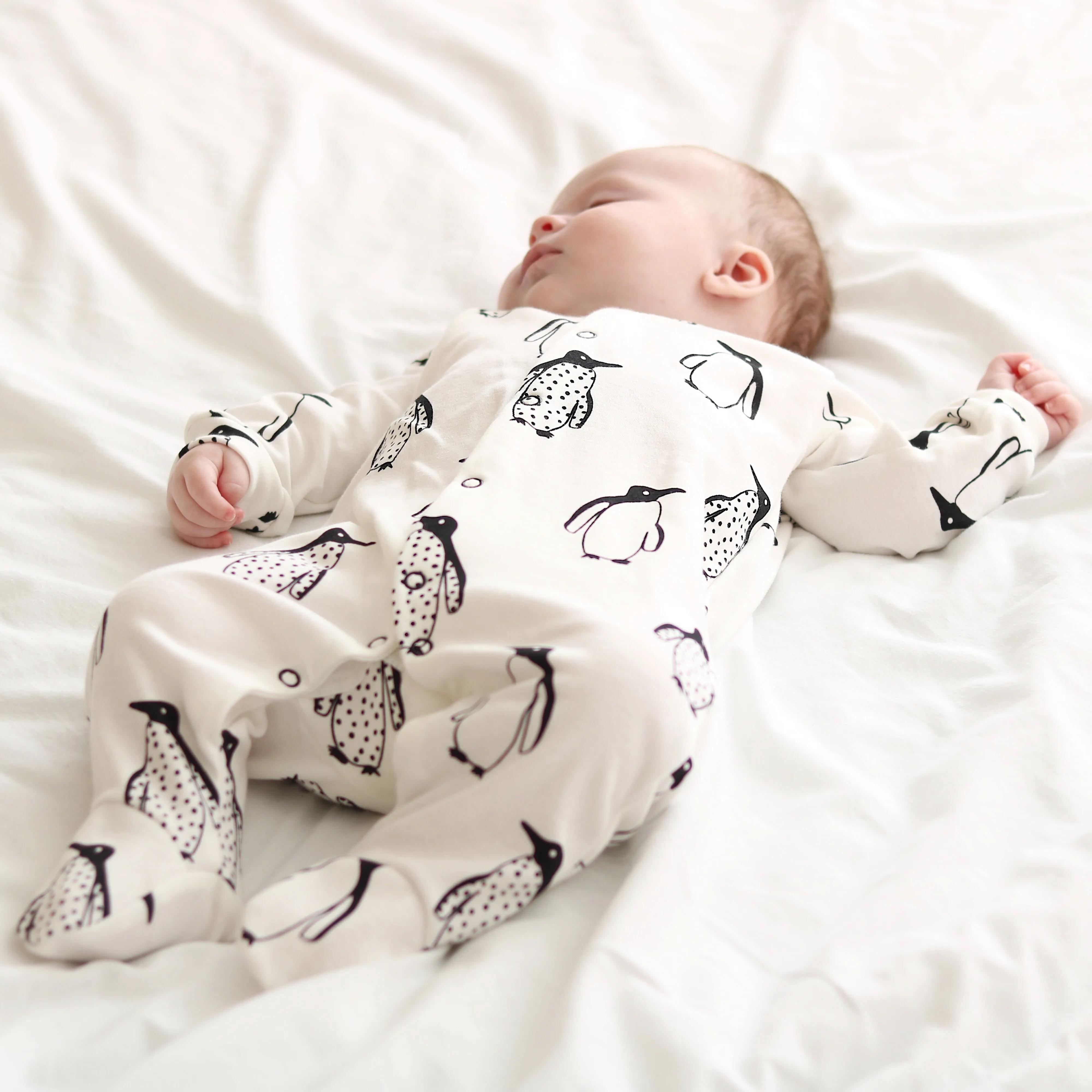 Milk Penguin cotton sleepsuit